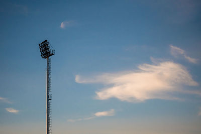 Low angle view of floodlight against sky