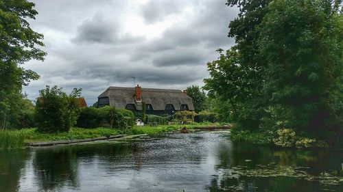 View of river against cloudy sky