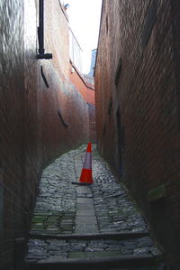 Red steps amidst buildings