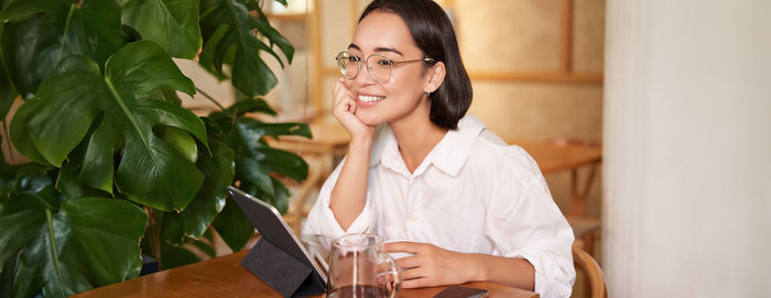 Young woman using mobile phone