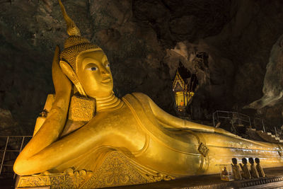 Statue of buddha outside building