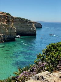 Scenic view of sea against clear sky