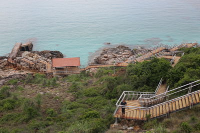 High angle view of buildings by sea