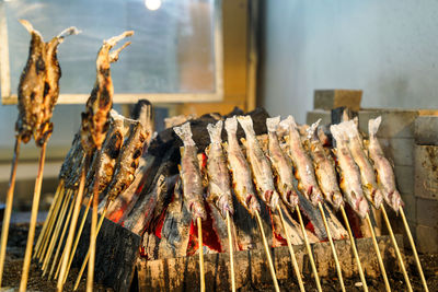 Close-up of meat on barbecue grill