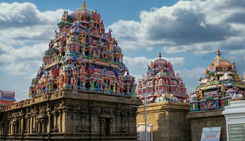 Low angle view of temple against building