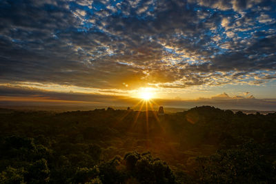 Scenic view of landscape against sky during sunset