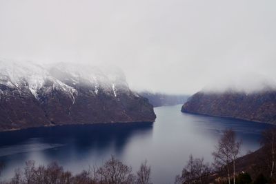 Scenic view of sea against sky during winter