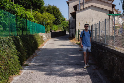 Man walking in alley