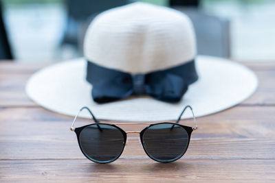 Close-up of sunglasses on table