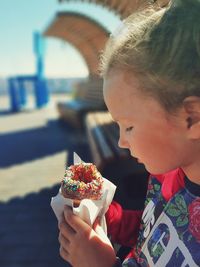 Portrait of girl holding ice cream