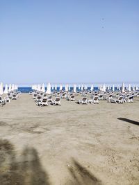 Scenic view of beach against clear sky