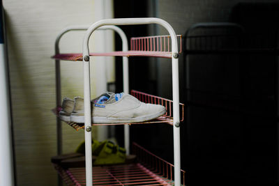 Close-up of shoe rack at home