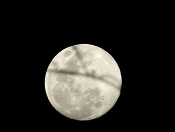 Low angle view of moon against sky at night