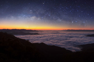 Scenic view of sea against sky at night