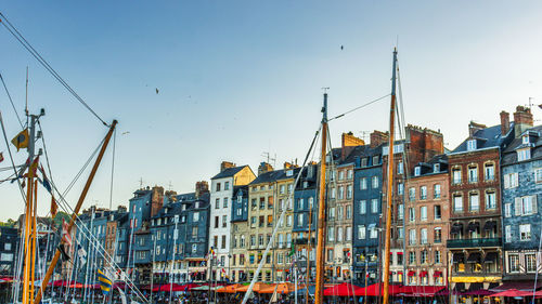 Buildings in city against sky