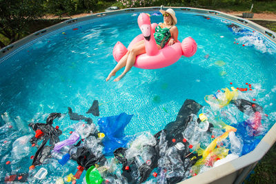 High angle view of man swimming in pool