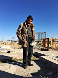 Silhouette of woman standing against clear sky