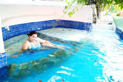 Portrait of woman in swimming pool