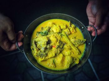 High angle view of person preparing food in bowl