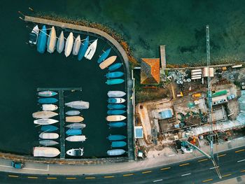 High angle view of boats moored at harbor