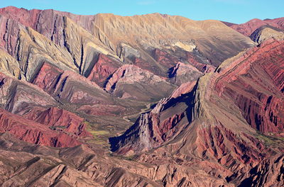 Aerial view of landscape with mountain range in background