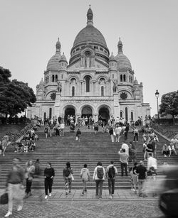 Group of people walking on street