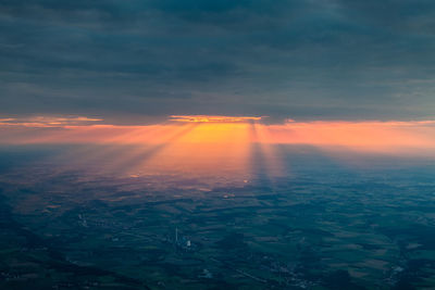 Scenic view of dramatic sky during sunset