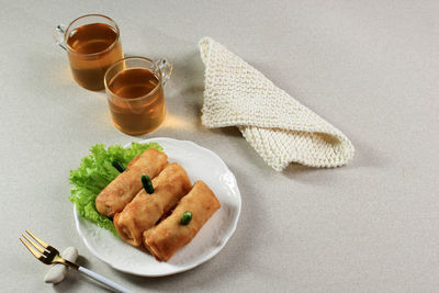 Sosis solo, minced chicken with egg crepe wrap and shape like sausage. 
