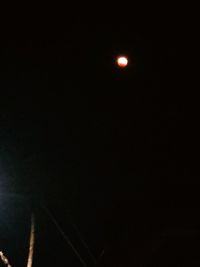 Scenic view of moon against sky at night