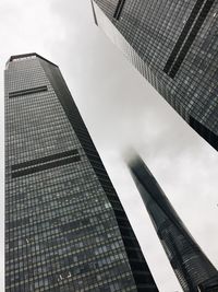 Low angle view of buildings in city against sky