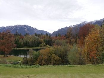 Scenic view of lake against sky during autumn