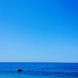 Boat sailing in sea