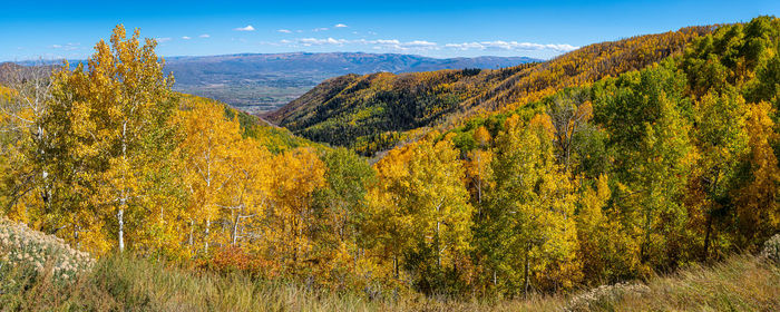 Scenic view of landscape against sky during autumn