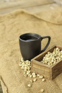 Close-up of coffee cup on table