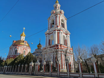 Low angle view of russian orthodox church against blue sky