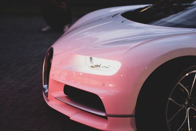 Close-up of black car on street