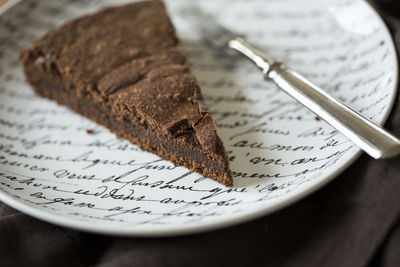 Close-up of chocolate cake in plate on table