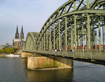 Hohenzollern bridge over rhine river against cologne cathedral