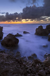 Scenic view of sea against sky during sunset