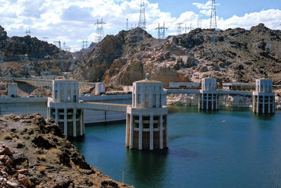 High angle view of dam by river against sky
