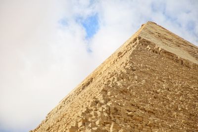 Low angle view of old building against sky