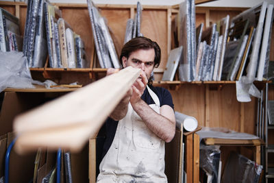 Man working on wood