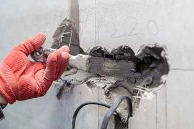 The electrician will plaster holes and channels for sockets and wires.