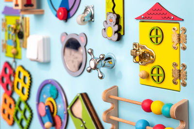 Close-up of multi colored toys on white background