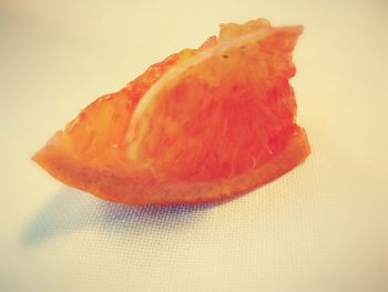 Close-up of fruit over white background