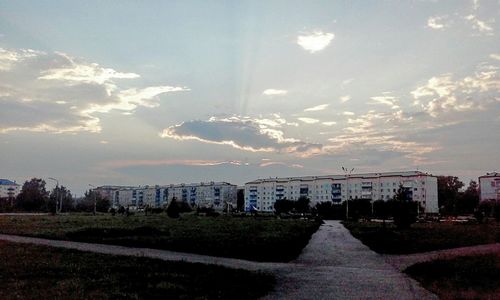 View of footpath with buildings in background