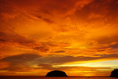 Scenic view of dramatic sky during sunset