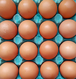 Full frame shot of eggs in container