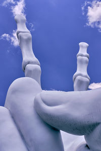 Low angle view of statue against sky