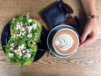 High angle view of coffee cup on table